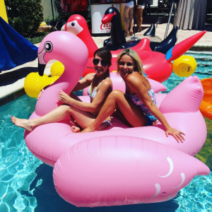 Two Women on a flamingo floaty