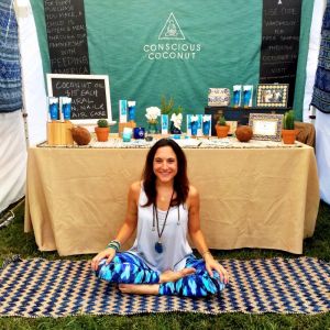 Woman sitting on a yoga matt