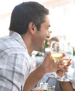 Man holding a glass of champagne 